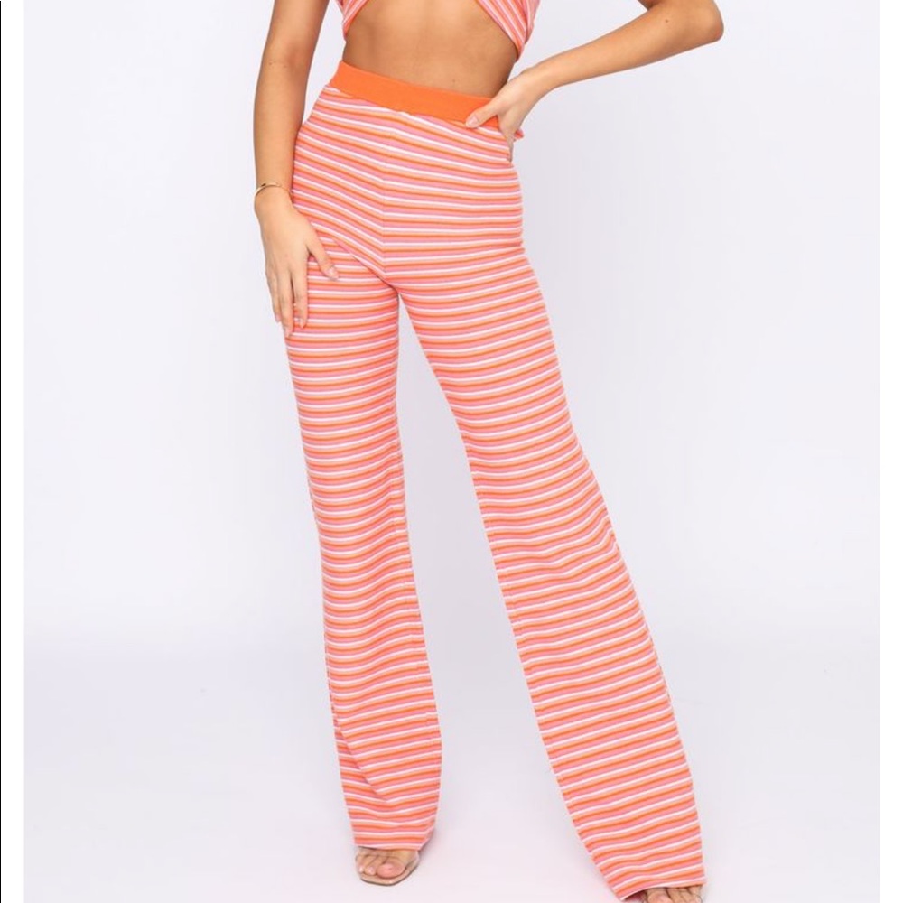 Pink and orange striped flare pants